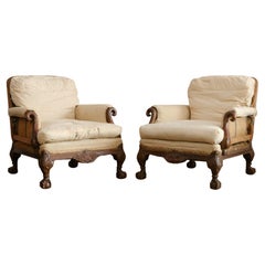 Pair of deep seated country house armchairs