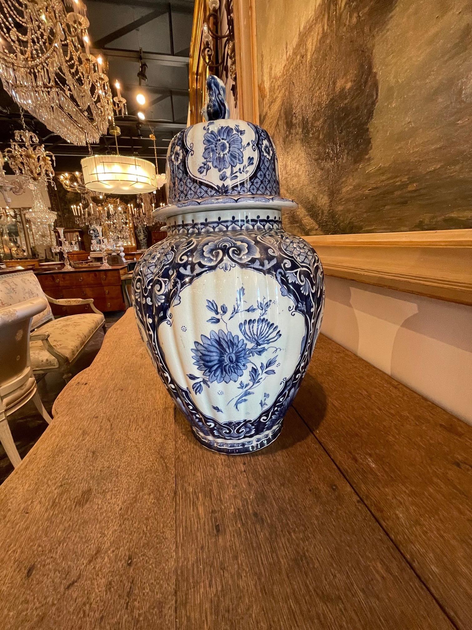 20th Century Pair of Delft Blue Porcelain Lidded Vases For Sale