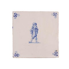 Pair of Delft double figure faience tiles in cobalt blue, c. 1600’s