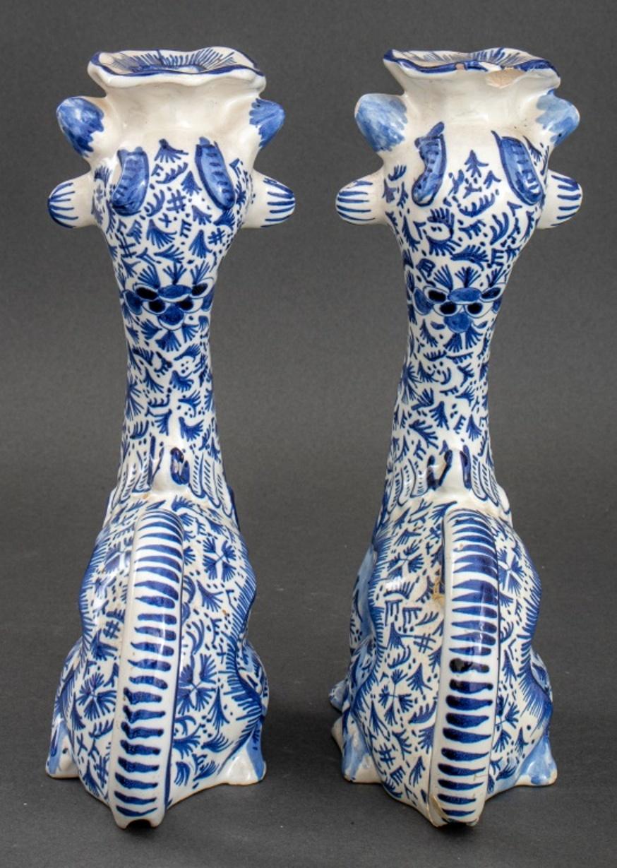 20th Century Pair of Delft Manner Lion Form Candlesticks For Sale