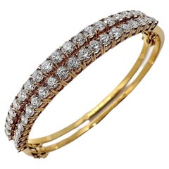 Pair of Delicate yet Dazzling 18k Gold and Diamond Hinged Bangle Bracelets