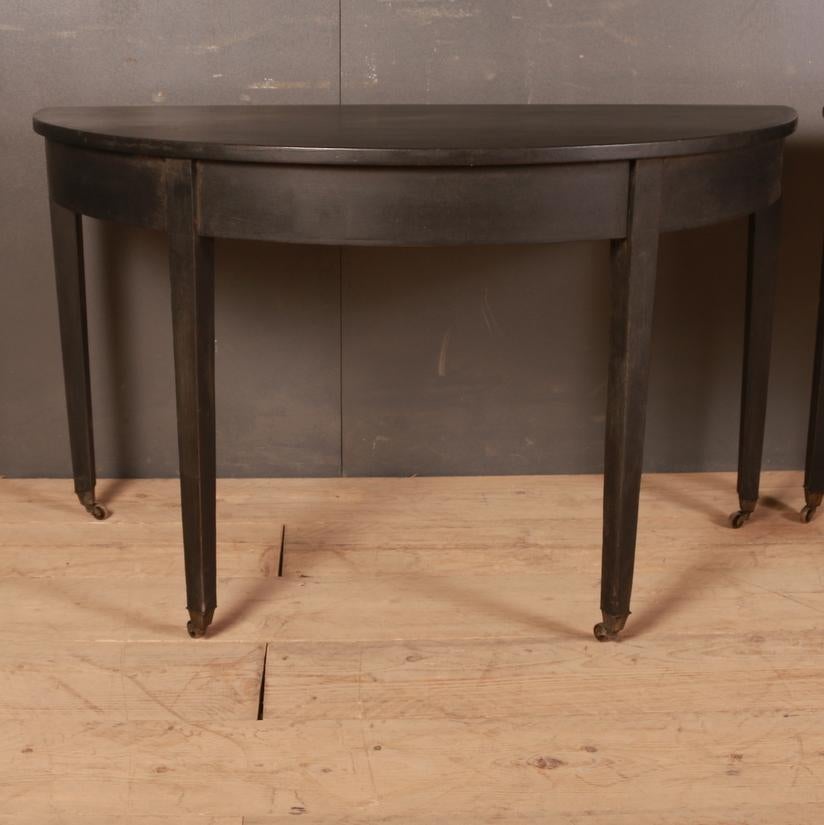 Good pair of 19th century painted demilune console table on castors, 1840

Dimensions:
49.5 inches (126 cms) wide
24.5 inches (62 cms) deep
9.5 inches (75 cms) high.

  