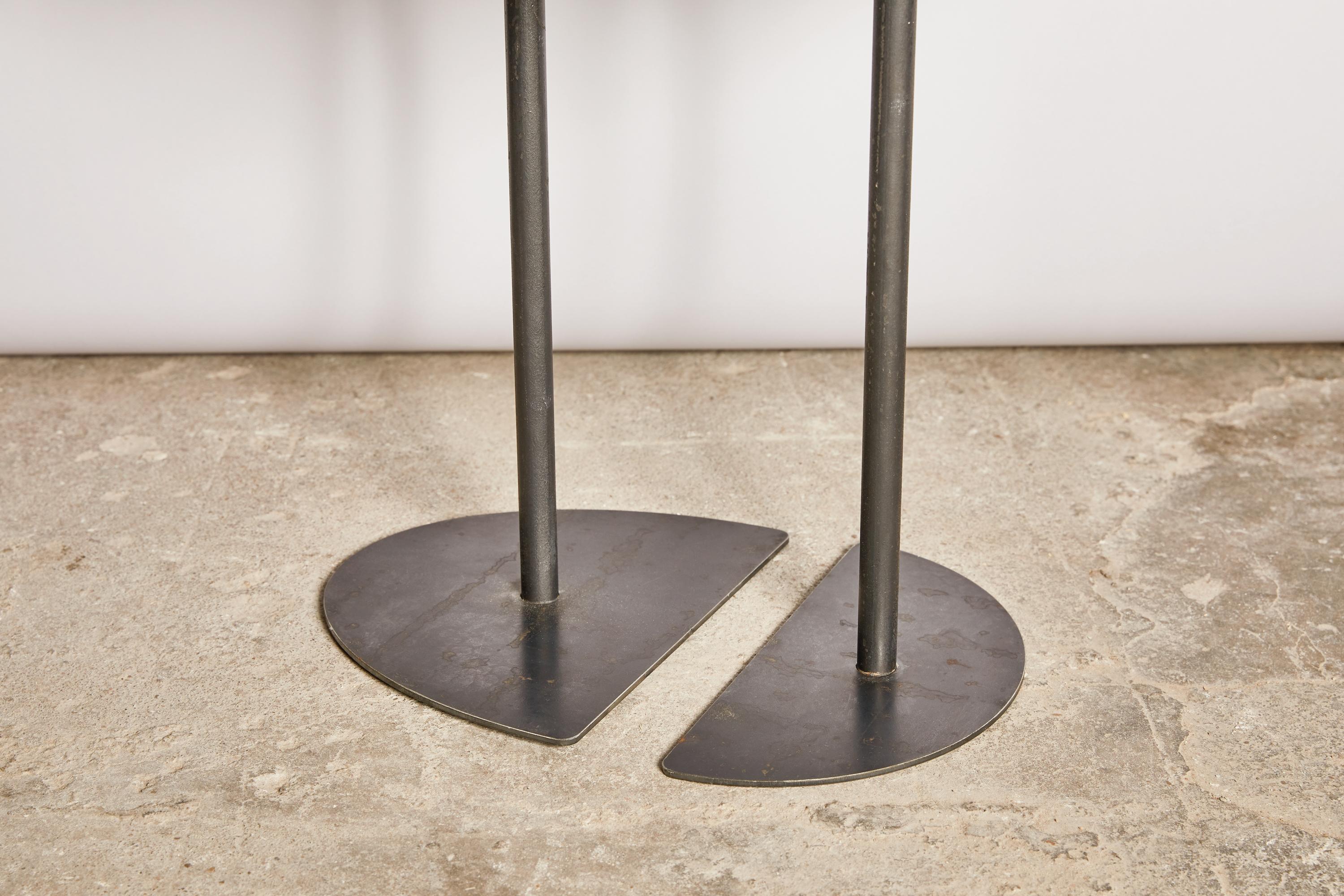 Pair of Demi-Lunes tables signed by Pia Chevalier
Also Available in Oxidized steel.
Dimensions:
Large: 60 x 27 cm H. 45 cm
Small: 40 x 18 cm H. 40 cm

Pia Chevalier is a French contemporary designer.
Independent Designer, trained in Design