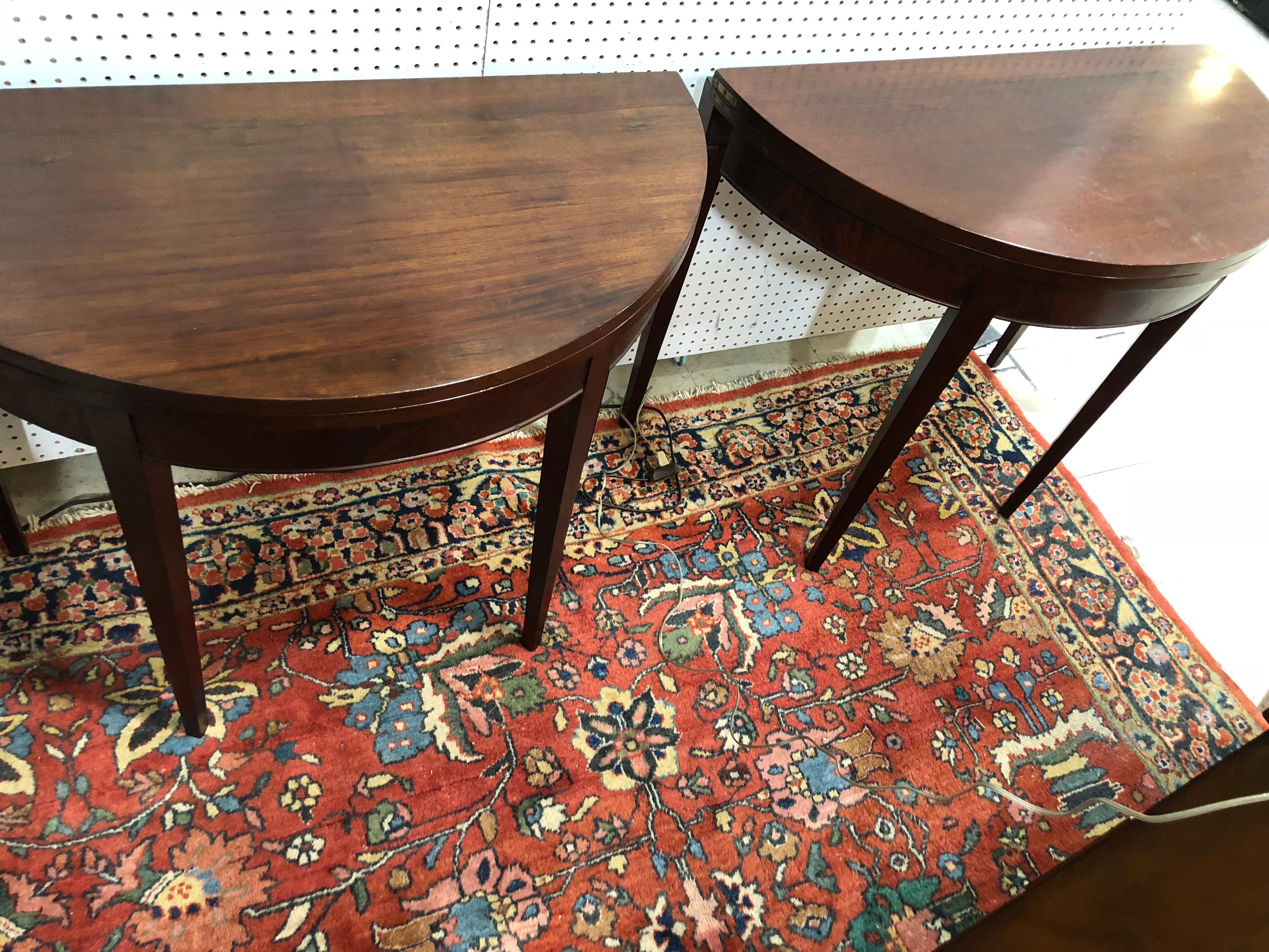 Exact pair of demilune flip top tables in mahogany. Great size, nice color, 1 gate leg on each to support the top to make a round table. Very sturdy, nice finish, a nice small pair of tables.