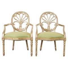 Dennis & Leen paire de fauteuils de style Louis XVI en argent doré 