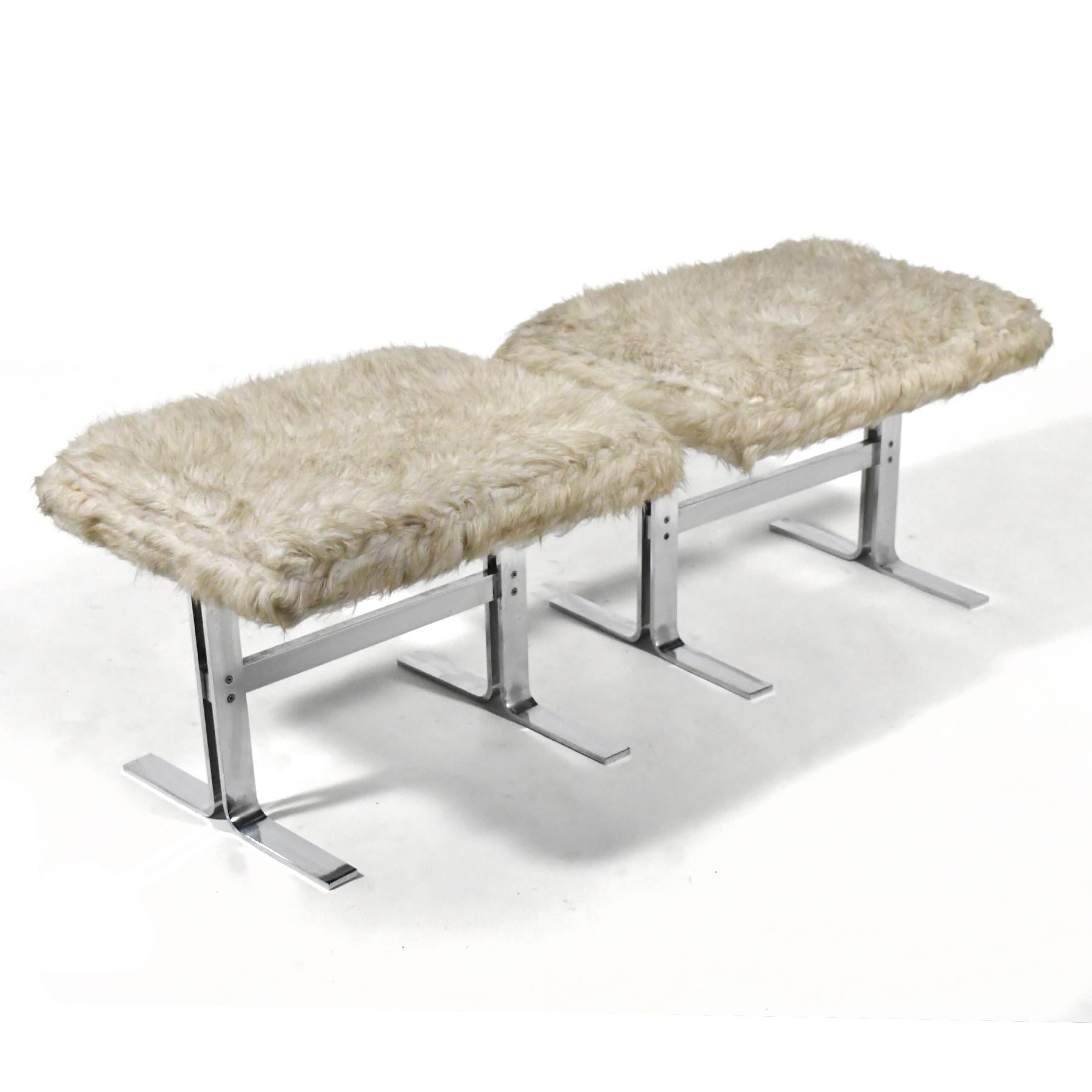 With strong architectural bases of solid chromed steel supporting upholstered seats (retaining their original faux fur) these stools by D.I.A. have an elegant restraint that reminds us of Nicos Zographos and a rationalist quality similar to Geoffrey