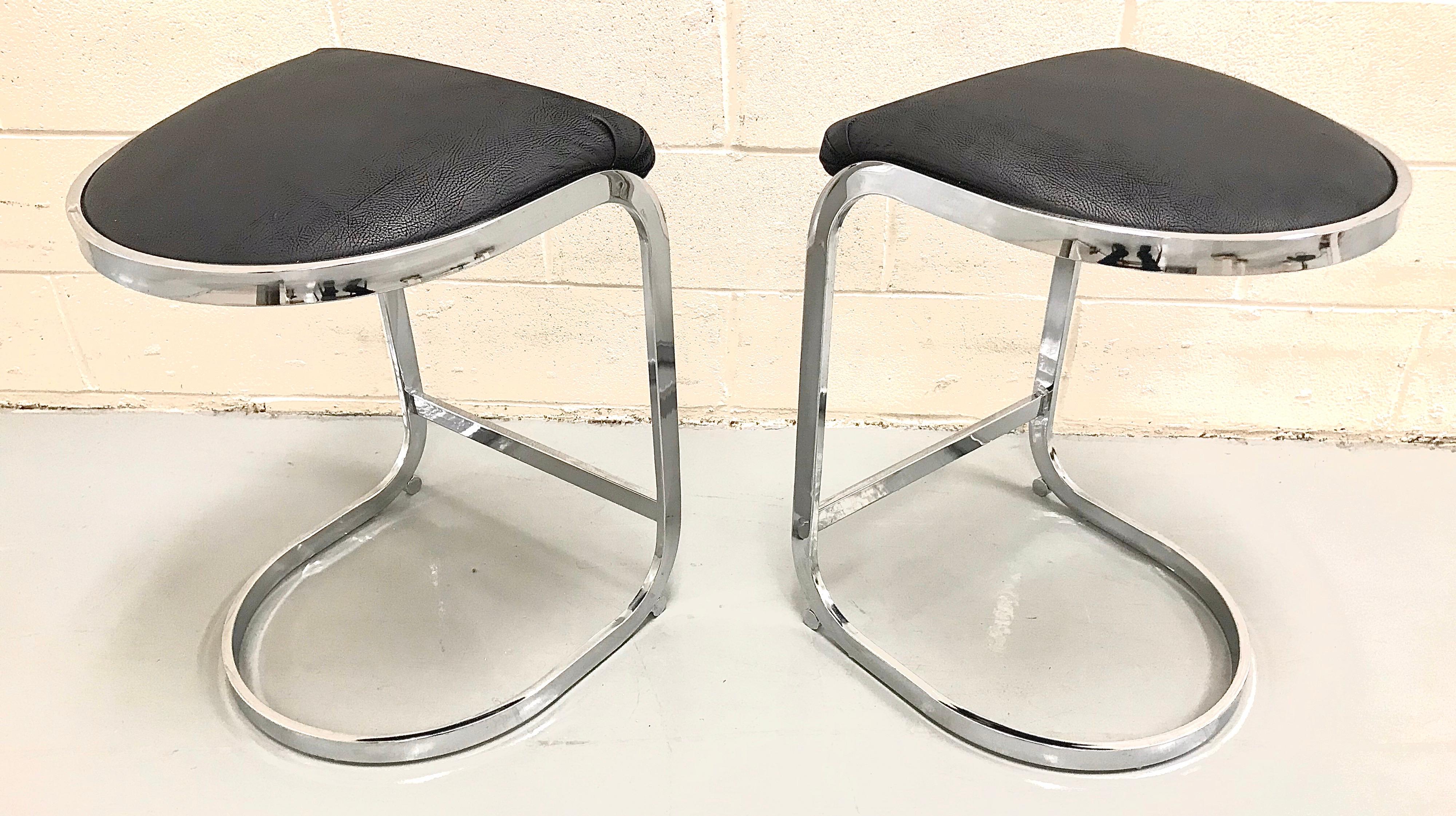 Pair of Design Institute of America chrome counter or bar stools.