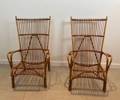 Paire de fauteuils design en rotin