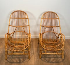 Paire de fauteuils design en rotin
