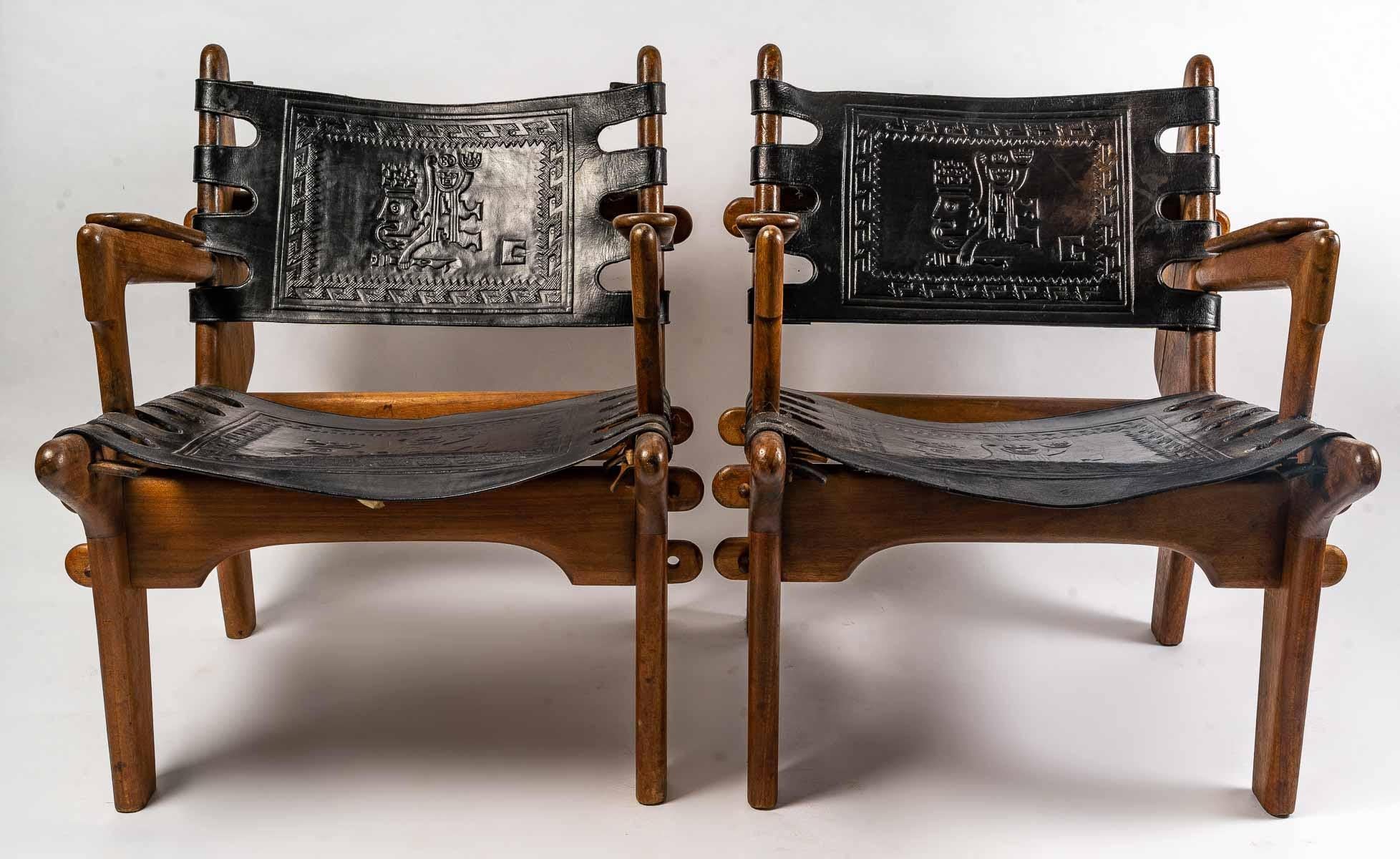 Pair of designer armchairs by Angel Pazmino, wood and leather, 1960
Measures: H: 78 cm, W: 65 cm, D: 75 cm.