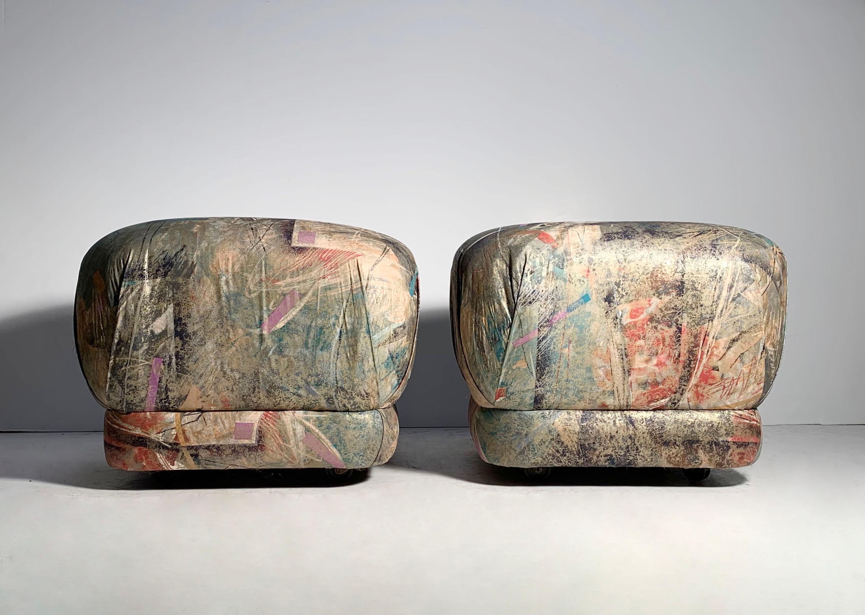 Pair of Post Modern Pouf ottoman stools on castors in the manner of Karl Springer.
Original owner purchased from Merchandise Mart in Chicago (A High End Decorator Designer Market)

I would recommend replacing the Castors on these as they do not