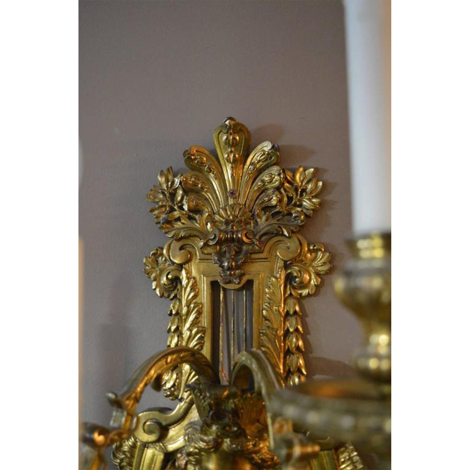 Pair of Detailed Bronze Sconces In Excellent Condition For Sale In Los Angeles, CA