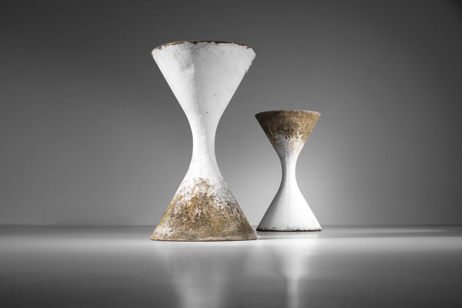 Mid-Century Modern Pair of diabolos planters by Willy Guhl from the 60s For Sale