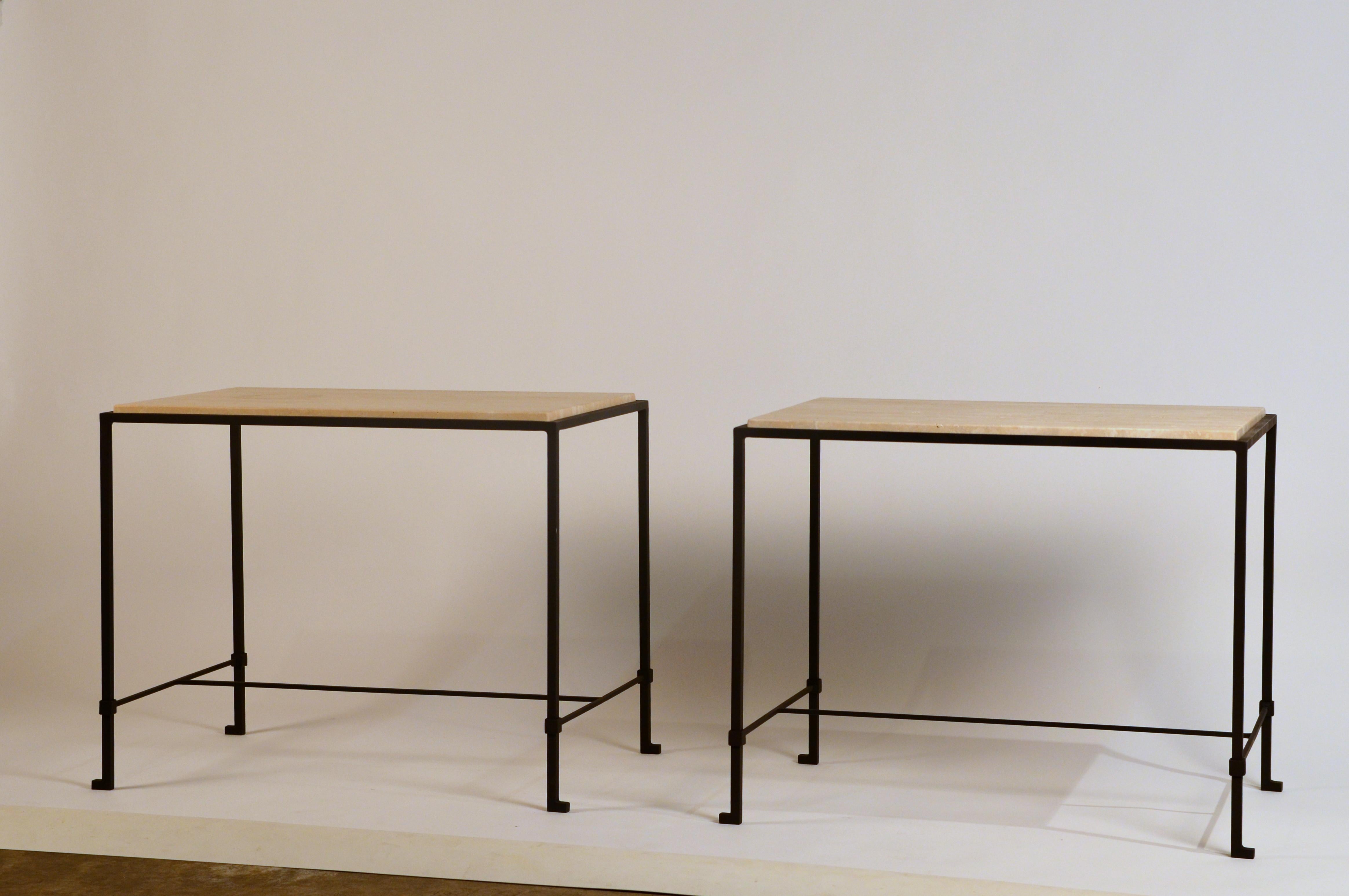 Pair of 'Diagramme' wrought iron and travertine side tables by Design Frères.

Lower bar is 4.5