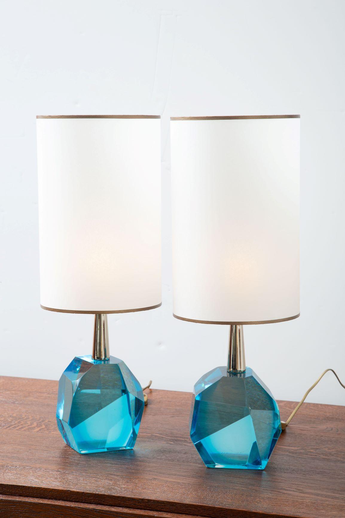 Pair of faceted diamond table lamps, in stock
Studio-made heavy solid rock translucent Murano glass
Aqua marine hue
Custom made parchment shades included.
Located in our store in Miami ready for shipping now.
3 pairs available
Priced per