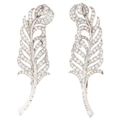 Pair of Diamond Feather Brooches in Platinum