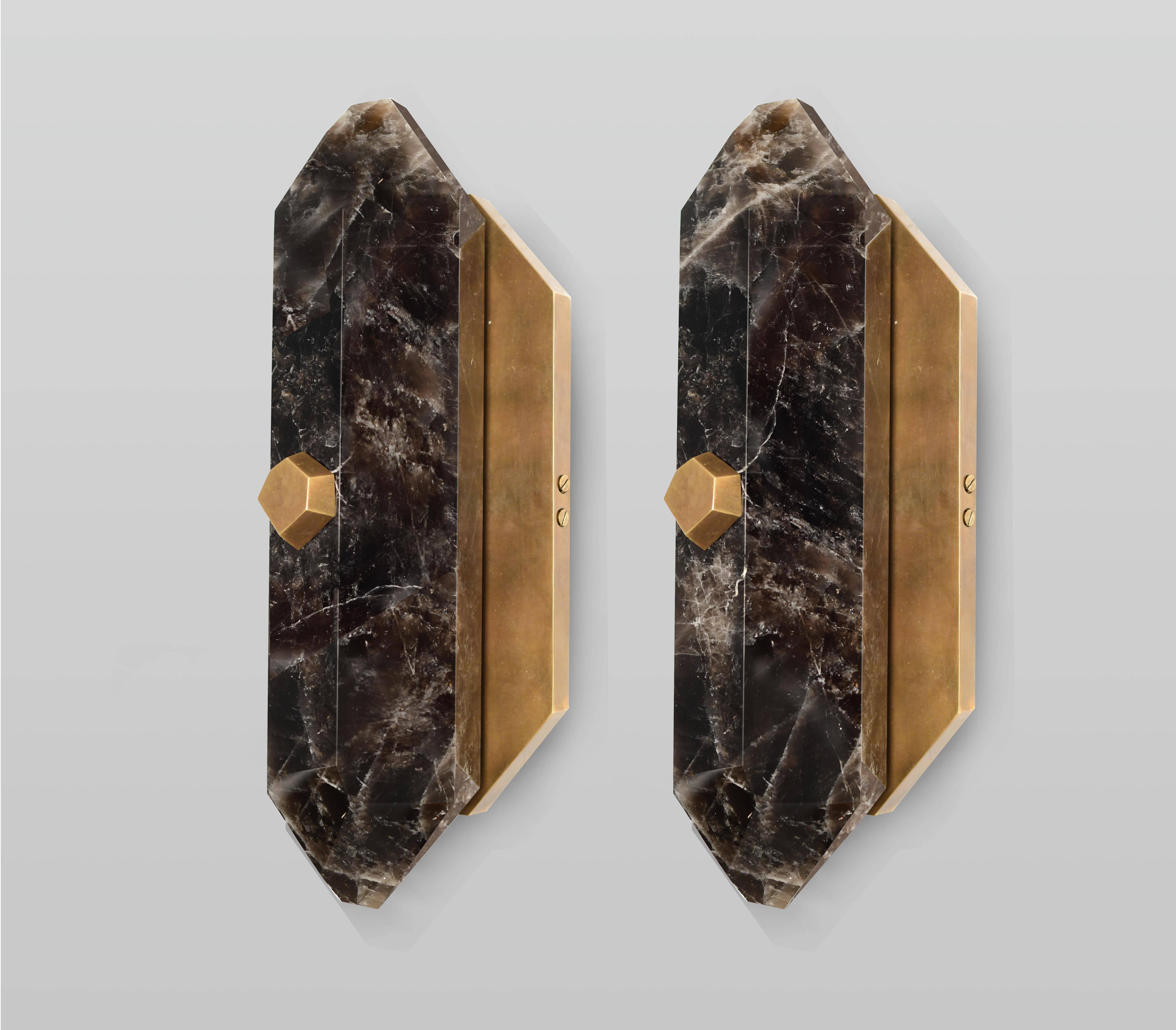 A fine carved diamond form dark rock crystal quartz wall sconces with the antique brass finish mount. created by Phoenix Gallery.
Custom measurement and finish available.
Each sconce installed two sockets, each socket use 60 watts LED light bulb and