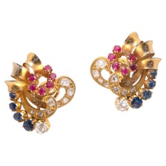 Pair of Diamond Ruby and Sapphire Earclips by Boucheron, Circa 1960