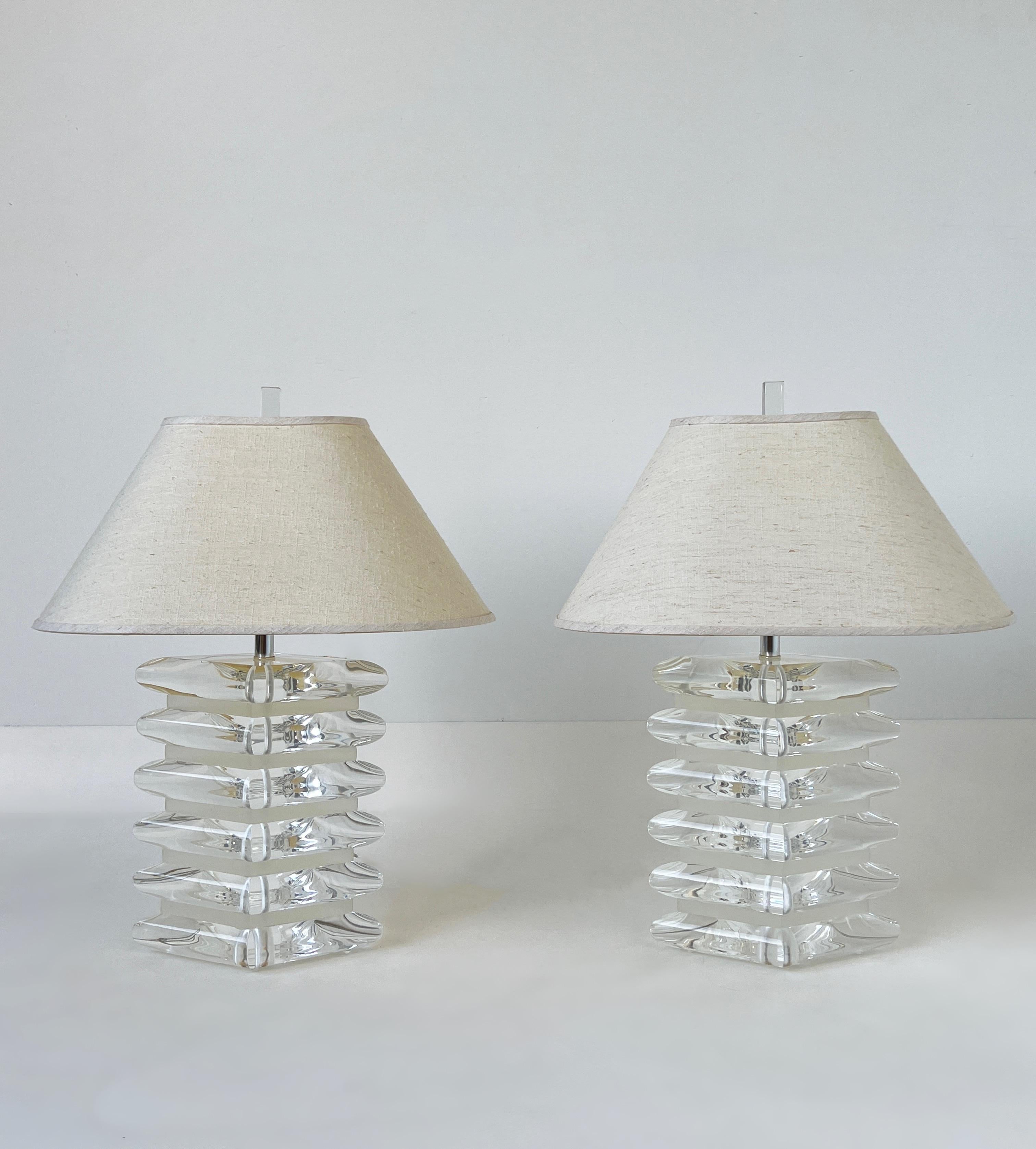 Pair of thick clear and satin diamond shape acrylic and chrome with linen shades table lamps from the 1980’s. 
In beautiful vintage condition, newly rewired.
The shades are original they show minor wear consistent with age. 
Measurements: 13”