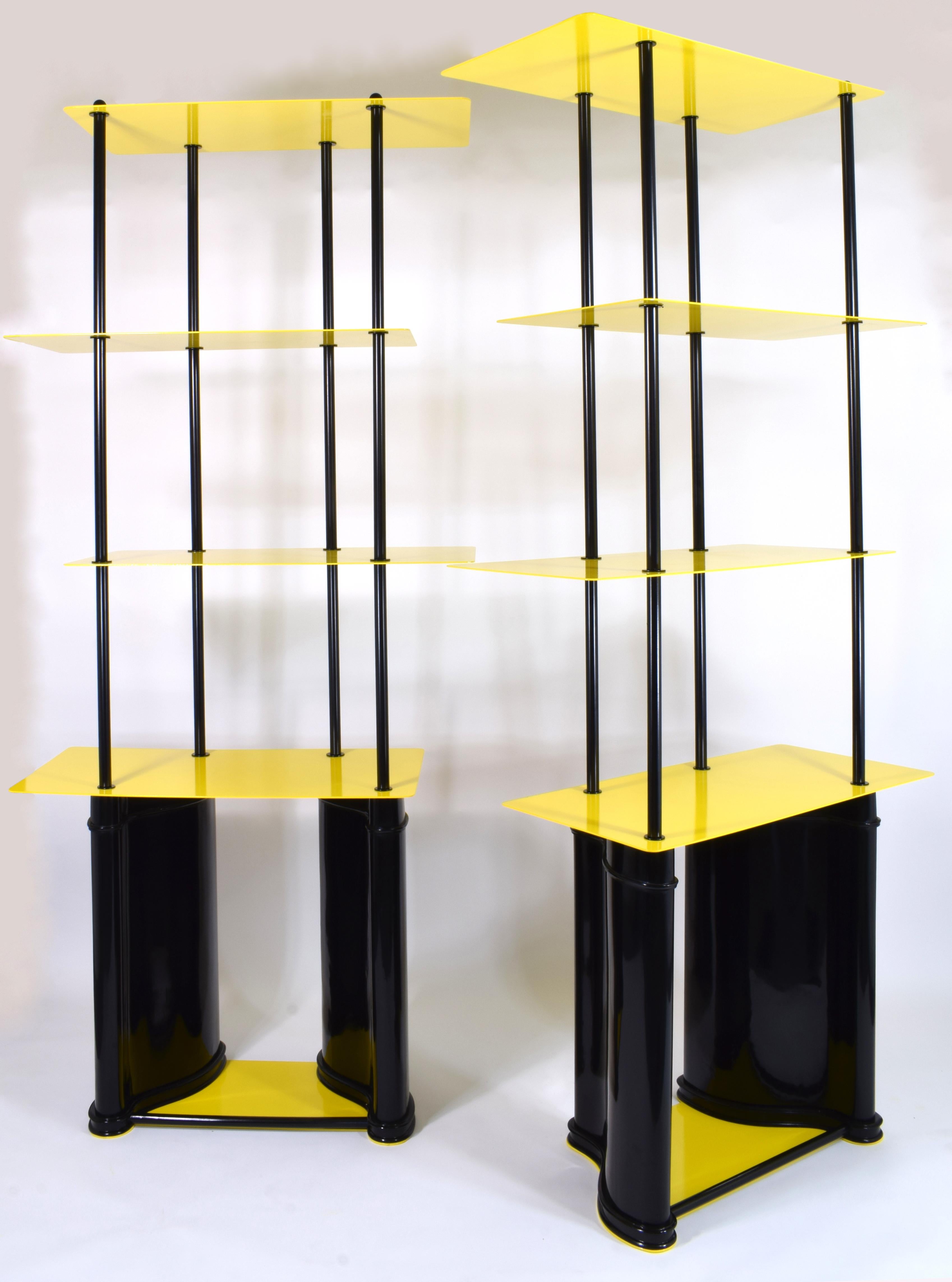 Pair of “DilàDiquà” bookcases from the “Trasformatio” collection,
design Michele Iodice exclusively for the Esprit Nouveau gallery.

Limited Edition 2/2

Movable structures in black and yellow pre-painted iron,
bases in shaped and ebonized