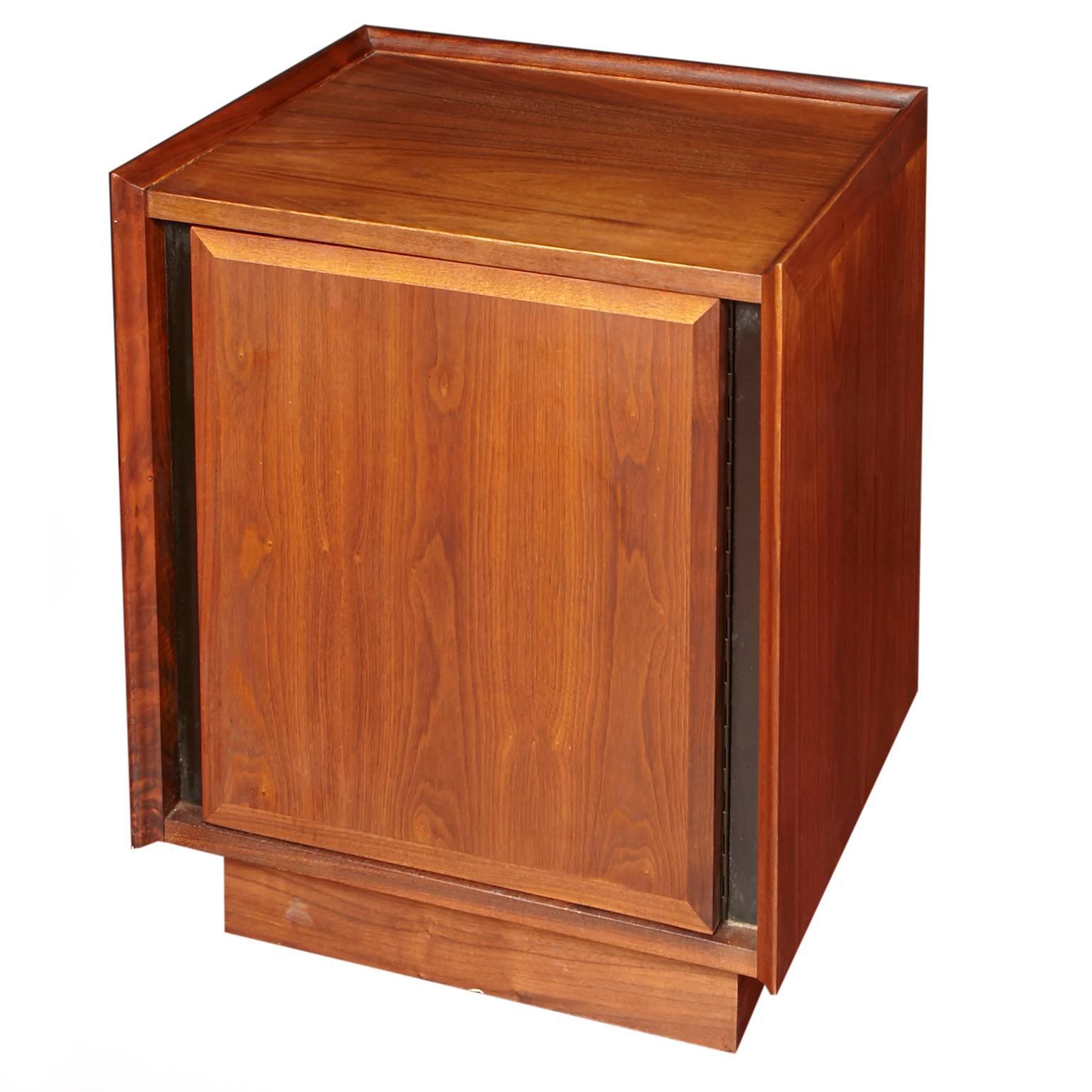 Exceptional pair of Dillingham nightstands/end tables made of walnut designed by Merton Gershun.
One interior drawer with roomy cabinet in each nightstand. Good vintage condition, lightly refinished.
 