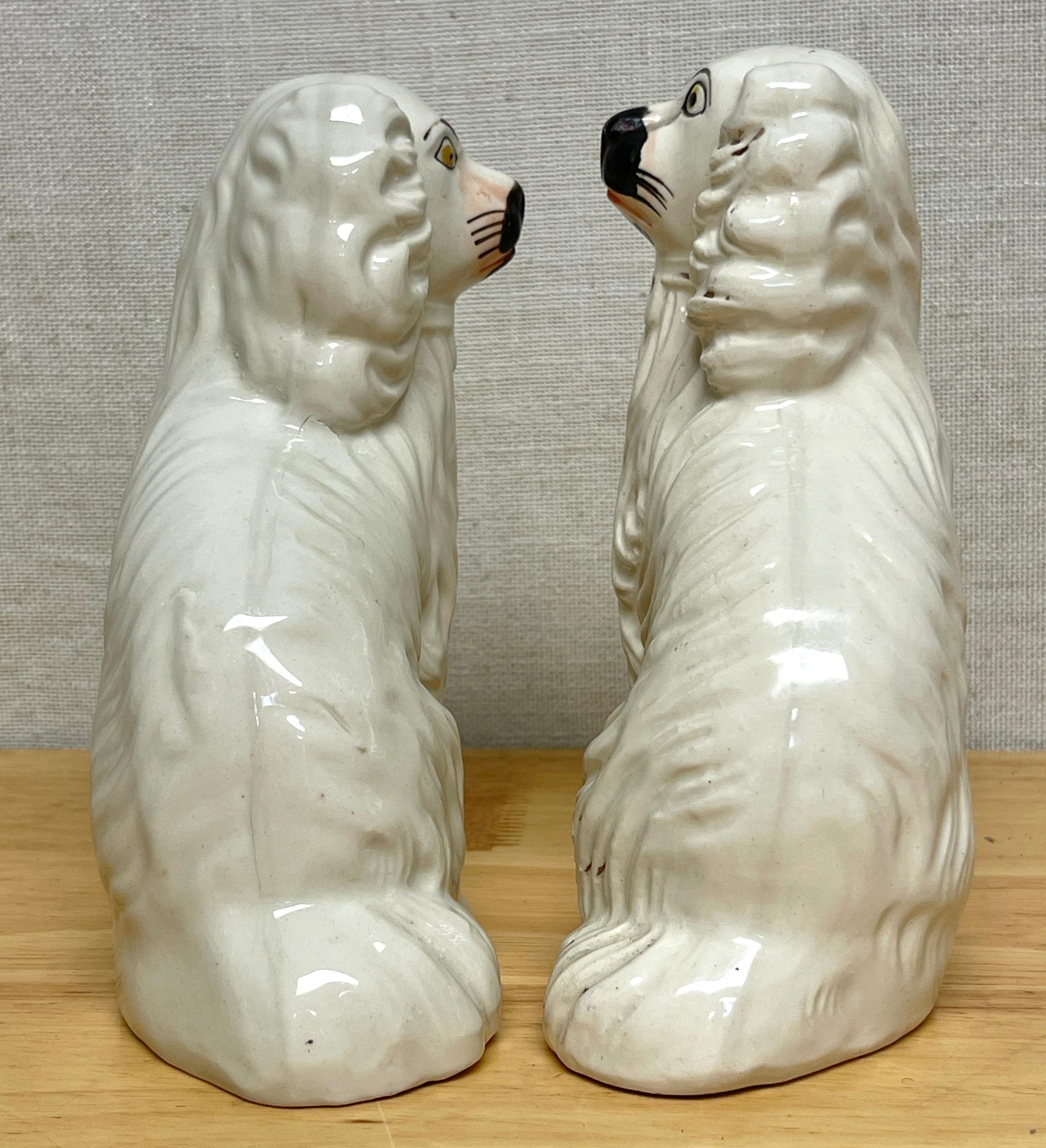 English Pair of Diminutive Antique Staffordshire Black & White Seated Spaniels, C. 1860s For Sale