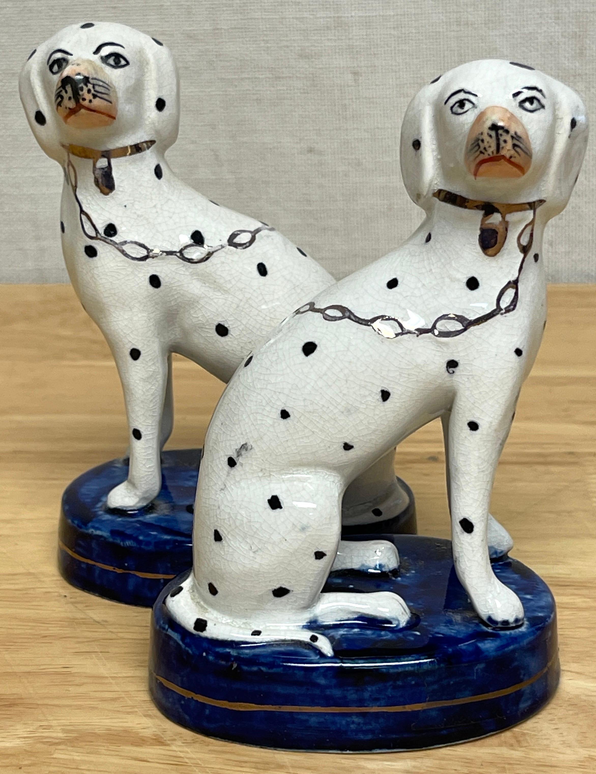 English Pair of Diminutive Antique Staffordshire Seated Dalmatians with Chains