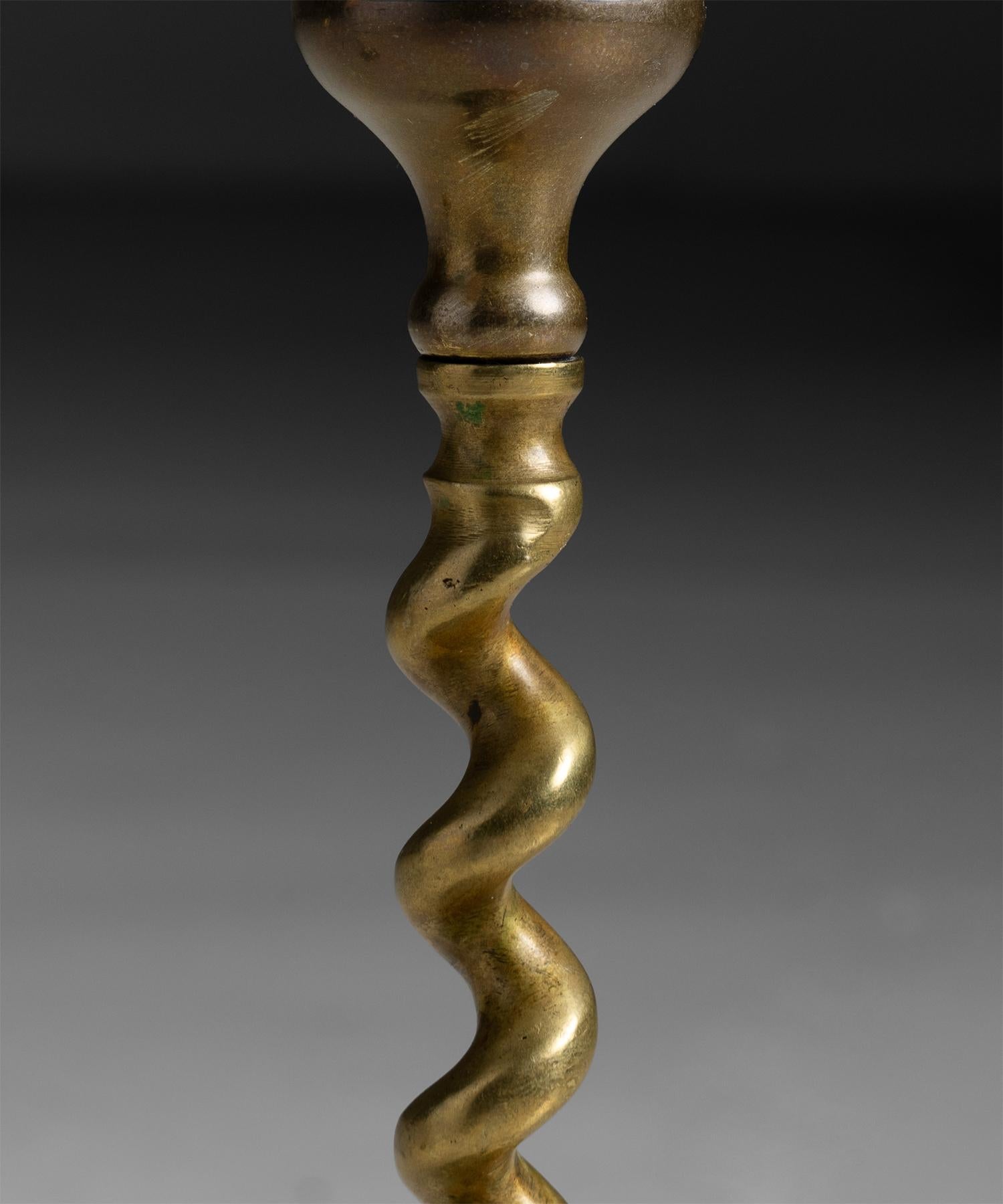 England circa 1920
Pair of brass candlesticks featuring spiraled stem
3