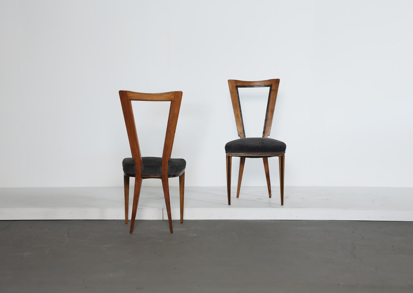 Rare pair of dining chairs, Italy, 1950s.  Fast shipping worldwide.


