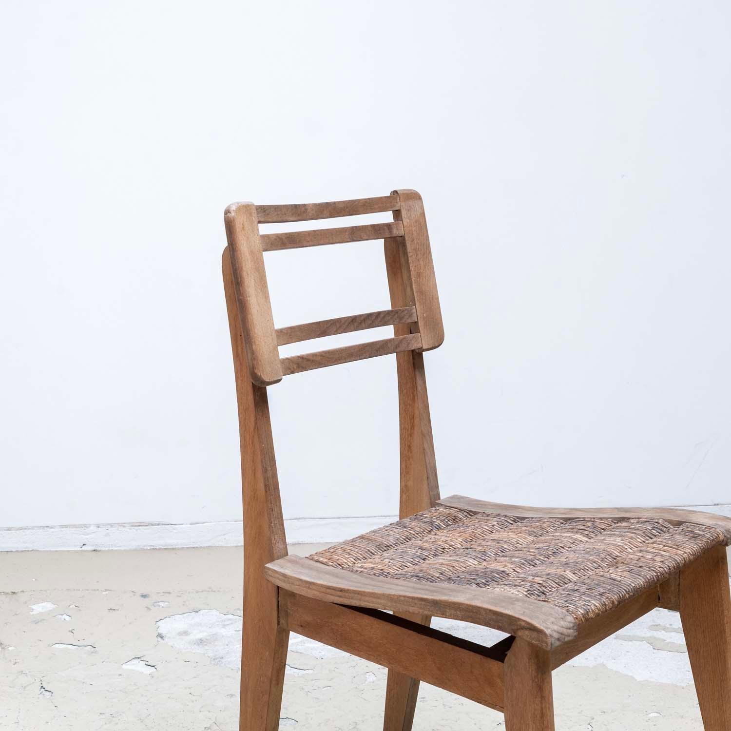 Paire de chaises de salle à manger en jonc par Pierre Cruège - style Roger Landault 1