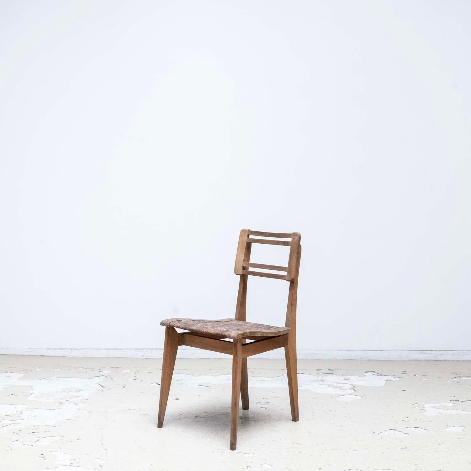Mid-Century Modern Paire de chaises de salle à manger en jonc par Pierre Cruège - style Roger Landault