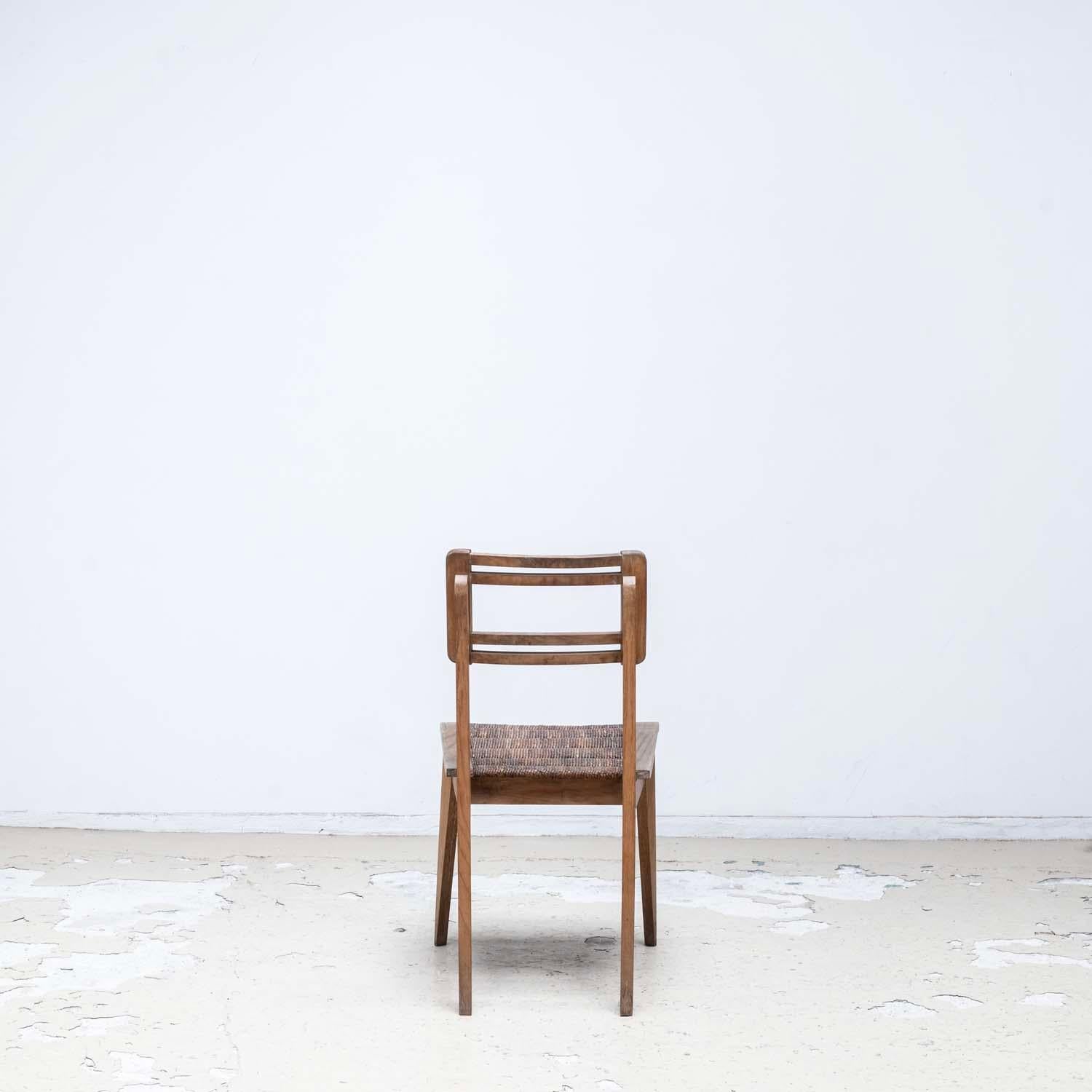 Travail du bois Paire de chaises de salle à manger en jonc par Pierre Cruège - style Roger Landault
