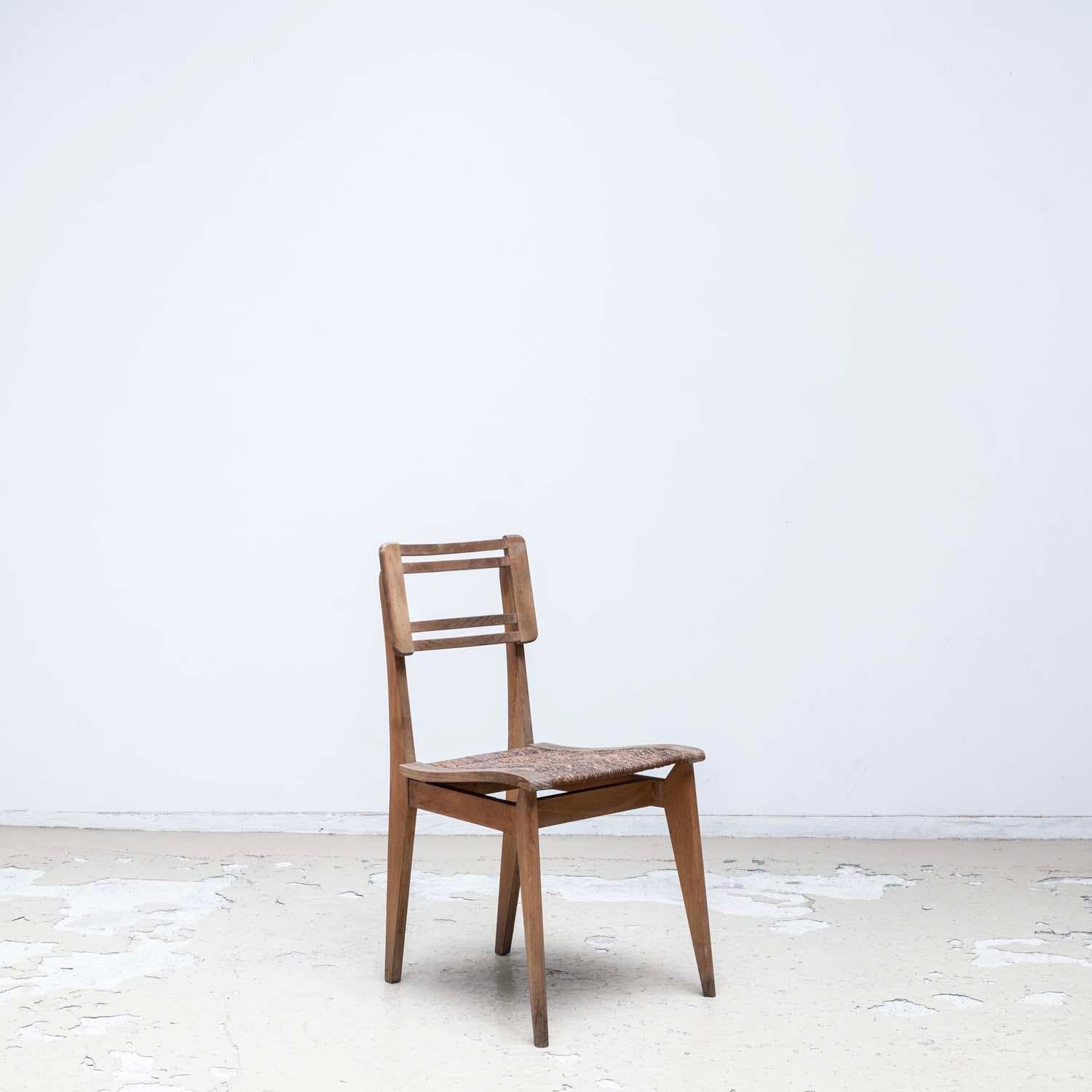 Jonc Paire de chaises de salle à manger en jonc par Pierre Cruège - style Roger Landault