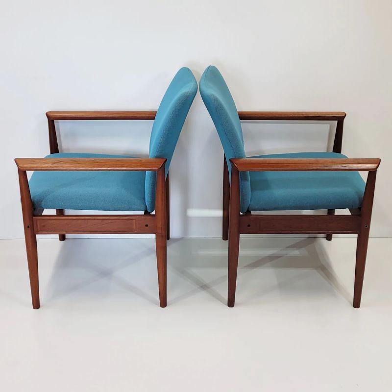 Armchairs created in 1961 by Finn Juhl, for Danish label France & Son. These are an early version and are becoming increasingly collectable. They have a teak wood structure, with geometric lines softened through curved finishes.

In very good