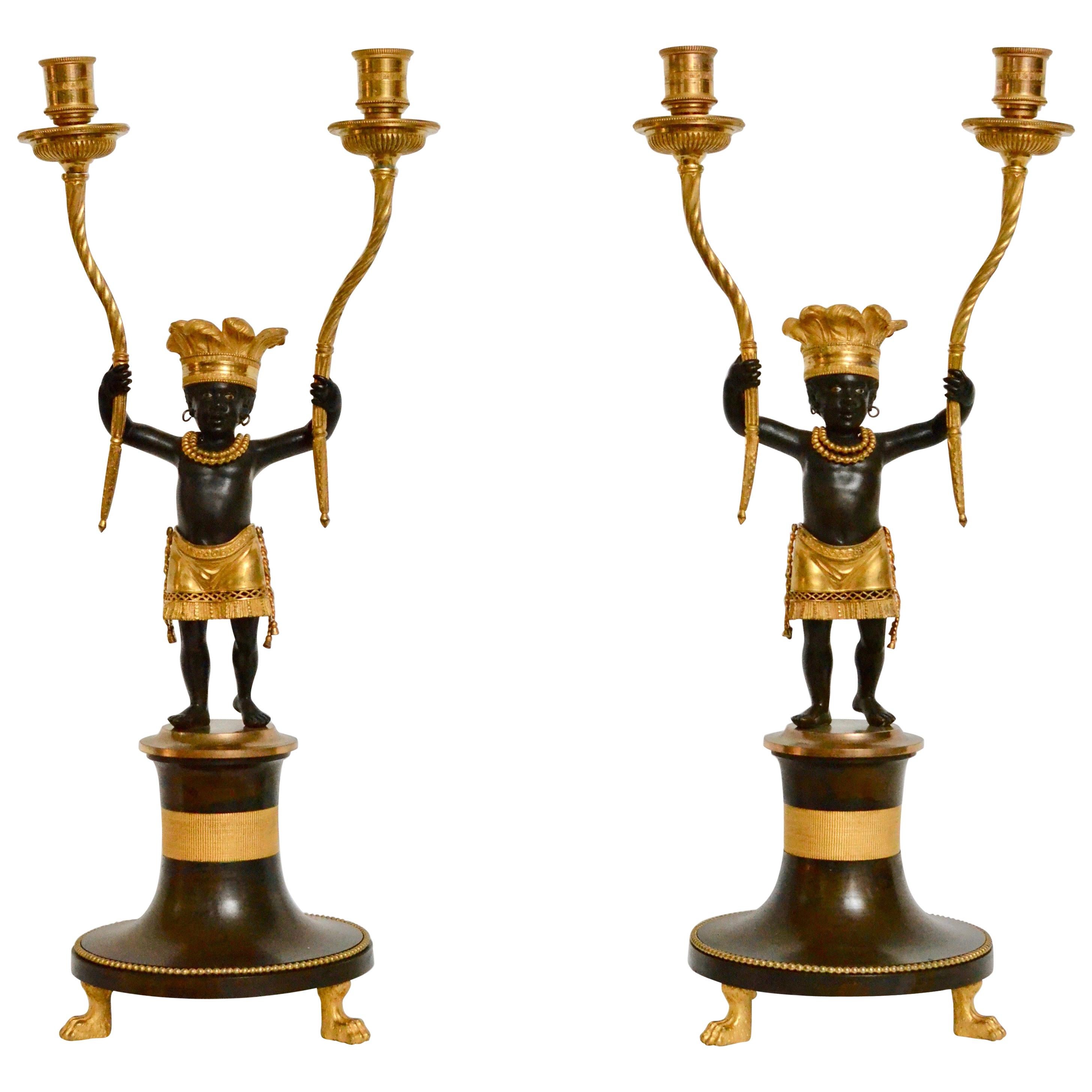 Pair of Directoire À L’amérique Ormolu and Patinated Bronze Candelabra