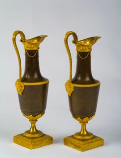 Pair of Directoire Gilt and Patinated Bronze Ewers