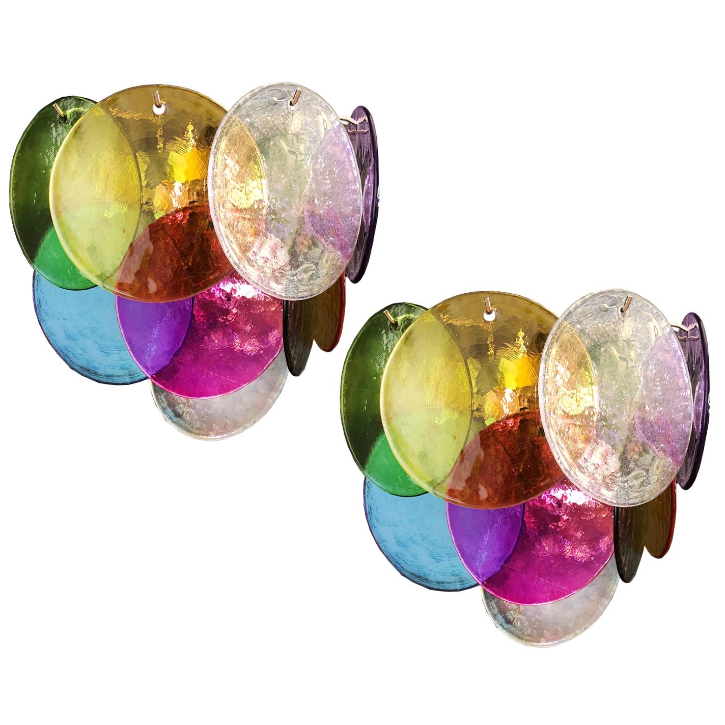 Set of Four vintage Italian Murano appliques in Vistosi style. Wall lights have 10 glass for each. multicolored. The glasses are now unavailable. Nickel metal frame.
Period: 1970s
Dimensions: 11 inches (28 cm) height; 13.40 inches (34 cm) width;