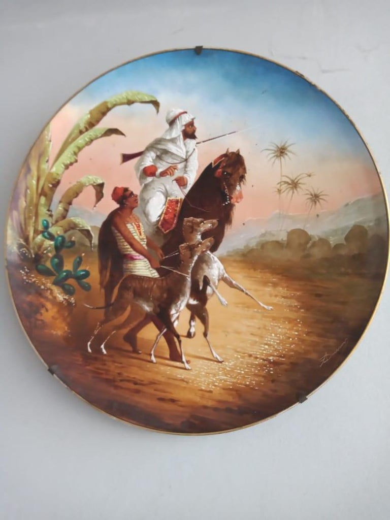 Pair of orientalist dishes
large plates. Origin France
earthenware material manufactured by montreau
19th century
signed by a factory artist (illegible)
perfect state
hand painted.