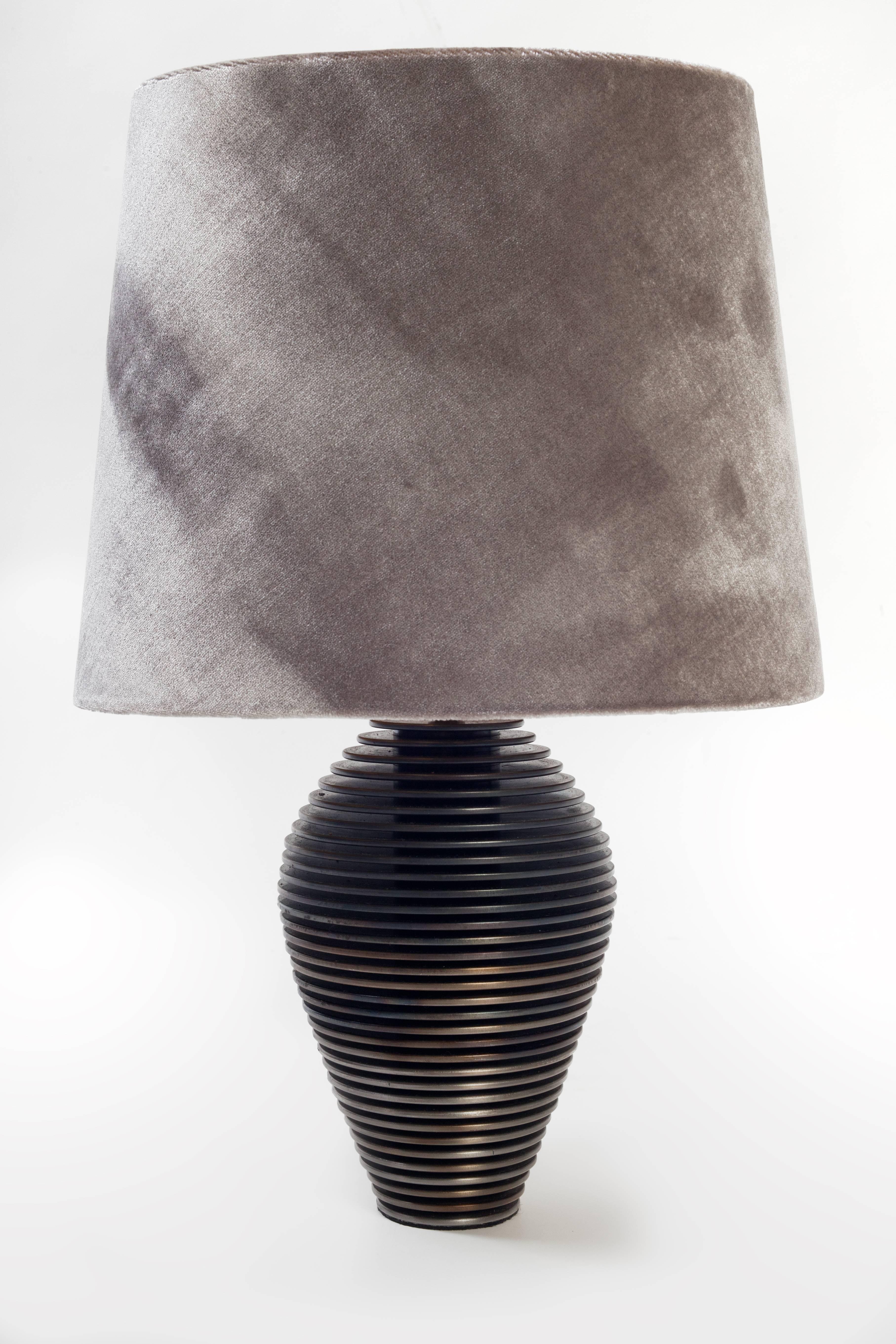 Heavy solid metal base and a elegant shade.
They appear like feminine and masculine.
To be on the the safe side, the lamp should be checked locally by a specialist concerning local requirements.