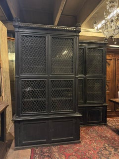 Pair of display cabinets in black lacquered wood with mesh glass, Italy