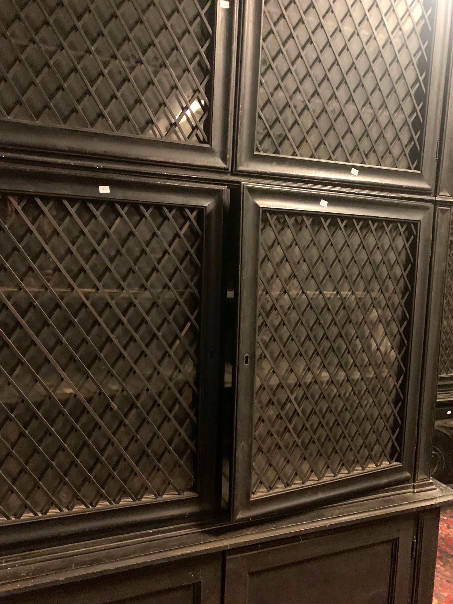 Italian Pair of display cabinets in black lacquered wood with mesh glass, Italy For Sale