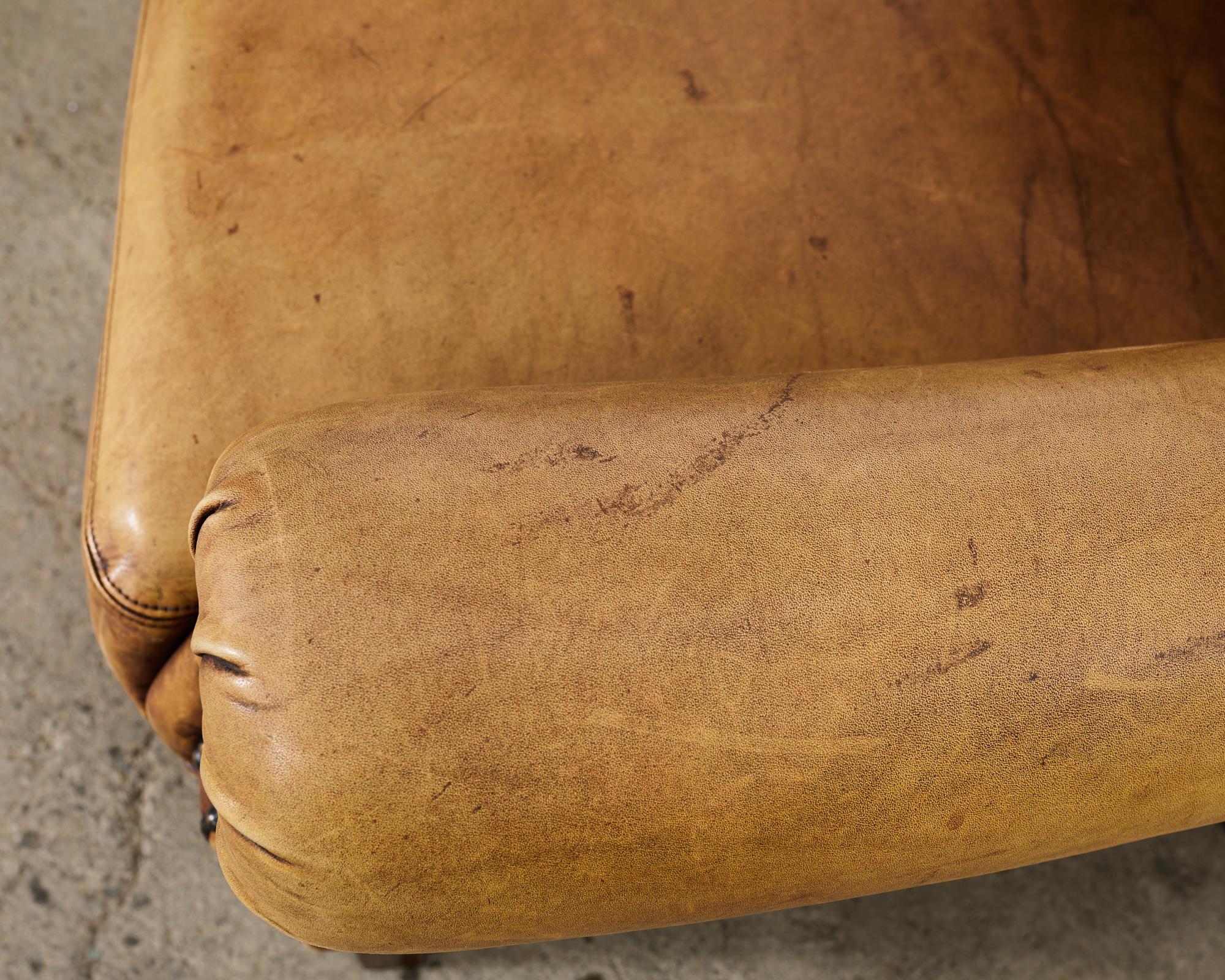 Pair of Distressed Cigar Leather Wingback Chairs with Ottomans 4