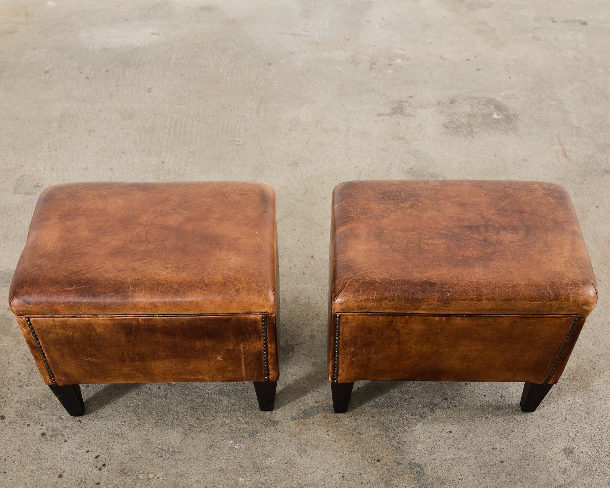 Pair of Distressed Cigar Leather Wingback Chairs with Ottomans 12
