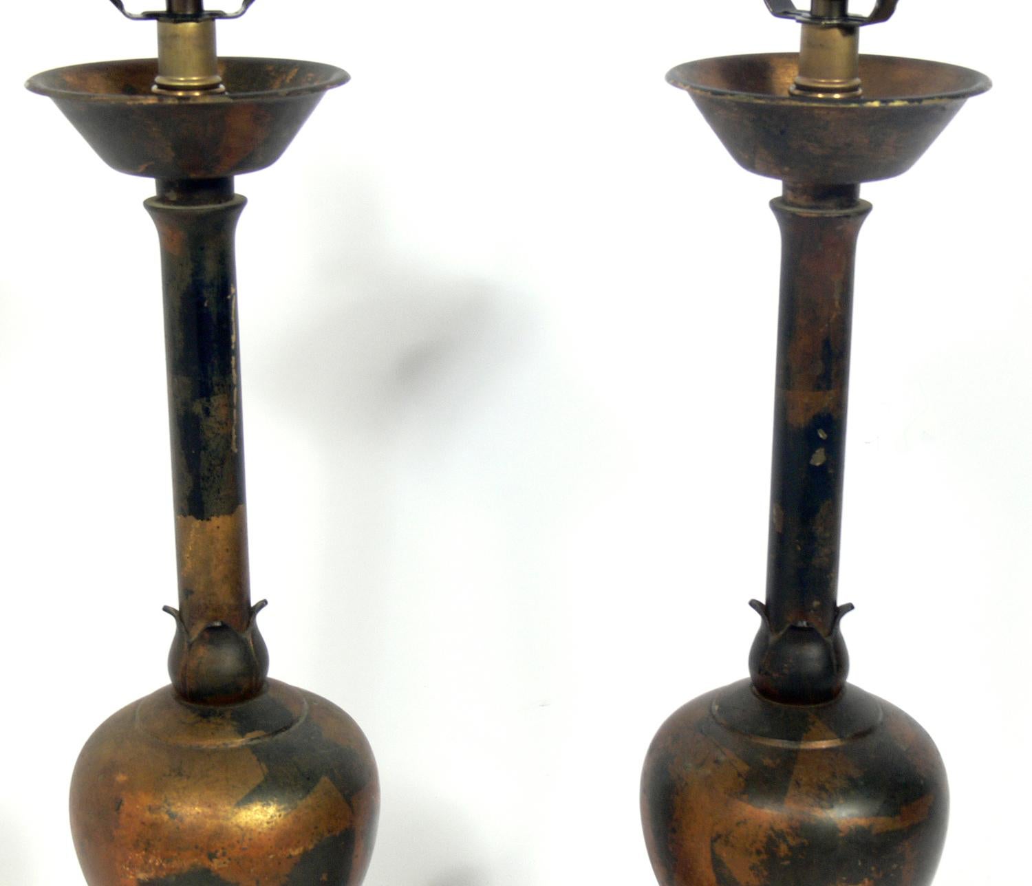 Chinese Pair of Distressed Gilt Metal Asian Lamps For Sale