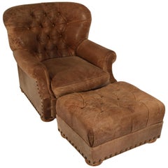 Pair of Distressed Leather Armchair and Ottoman in the Style of Ralph Lauren