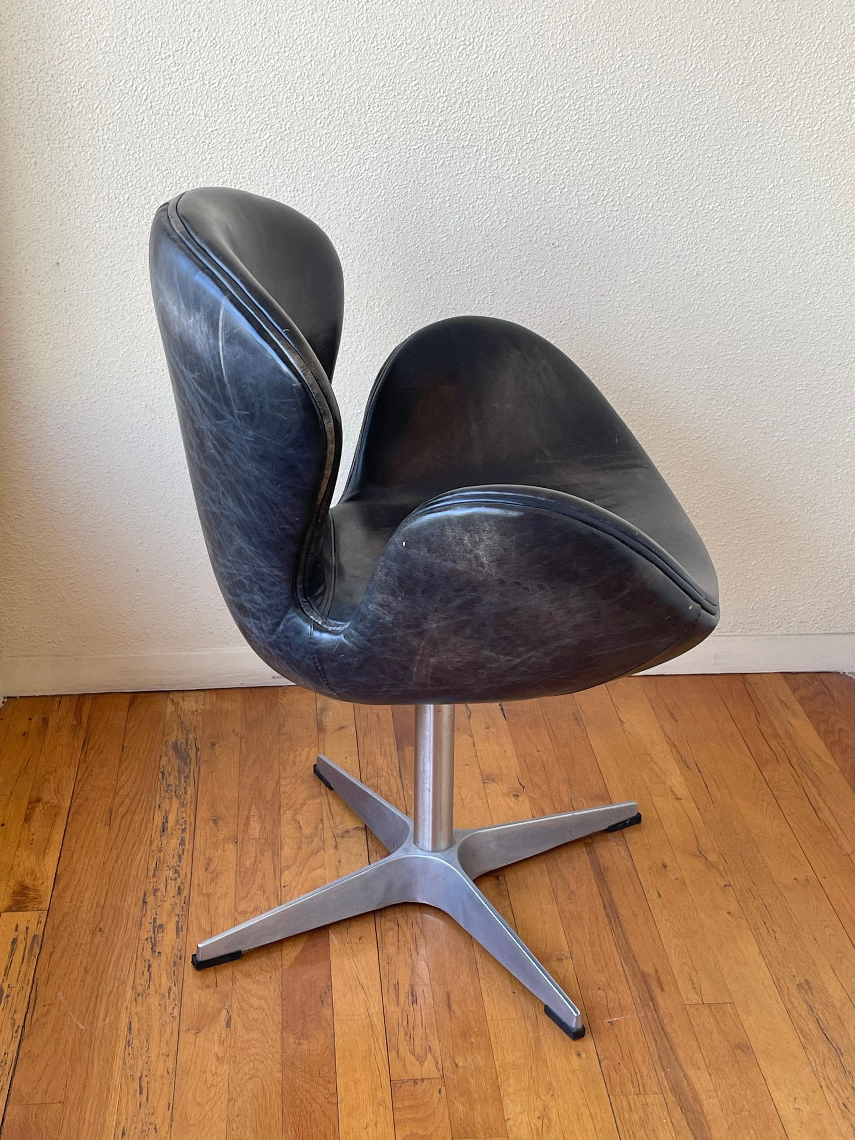 20th Century Pair of Distressed Leather on Swivel Base