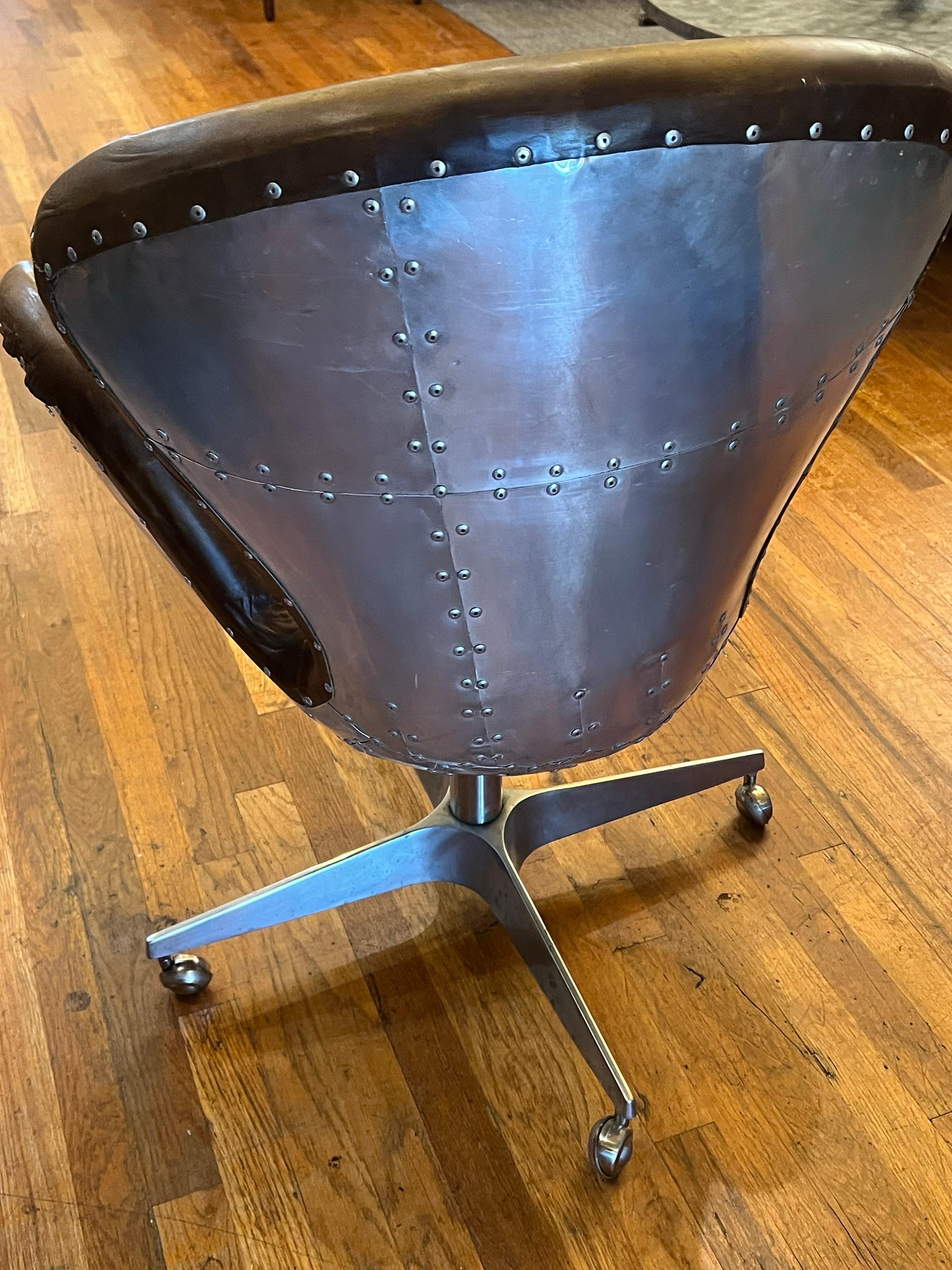 Mid-Century Modern Pair of Distressed Leather Swivel Base Aviator Armchairs by Restoration hardware For Sale