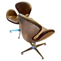 Pair of Distressed Leather Swivel Base Aviator Armchairs by Restoration hardware