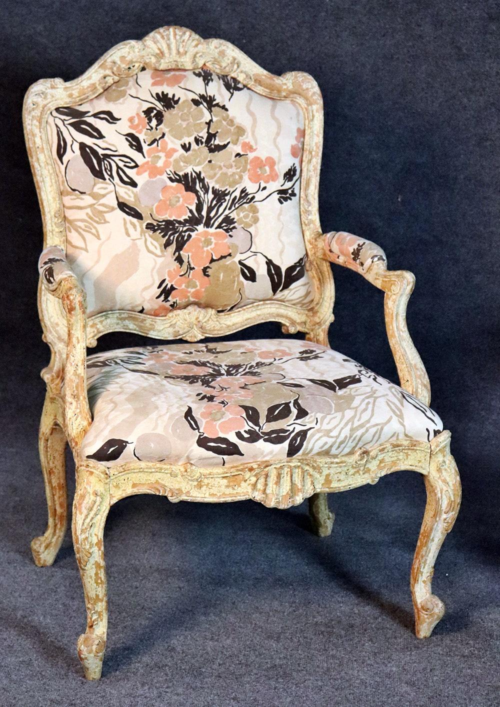 Pair of distressed painted Louis XV style fauteuils.