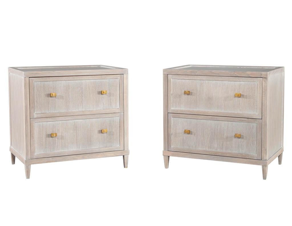 Pair of distressed washed oak nightstands end tables. New, made in the USA and custom finished by the Carrocel Artisans in a beautiful, distressed finish with unique ribbed drawer fronts. Completed with brass color hardware and black felted drawer